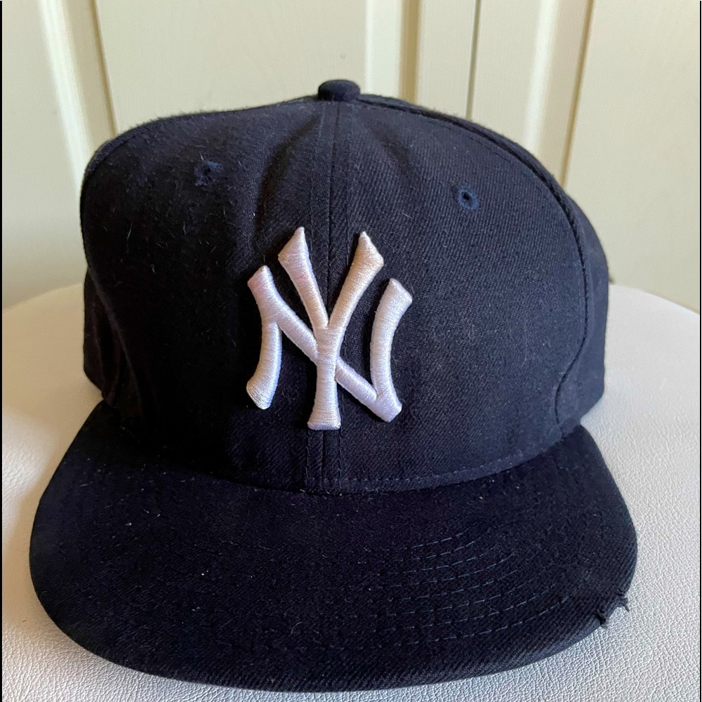 NY Yankees hat.